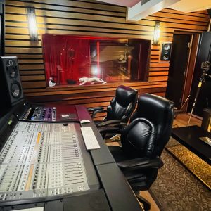 Cozy recording studio equipments and comfortable chairs